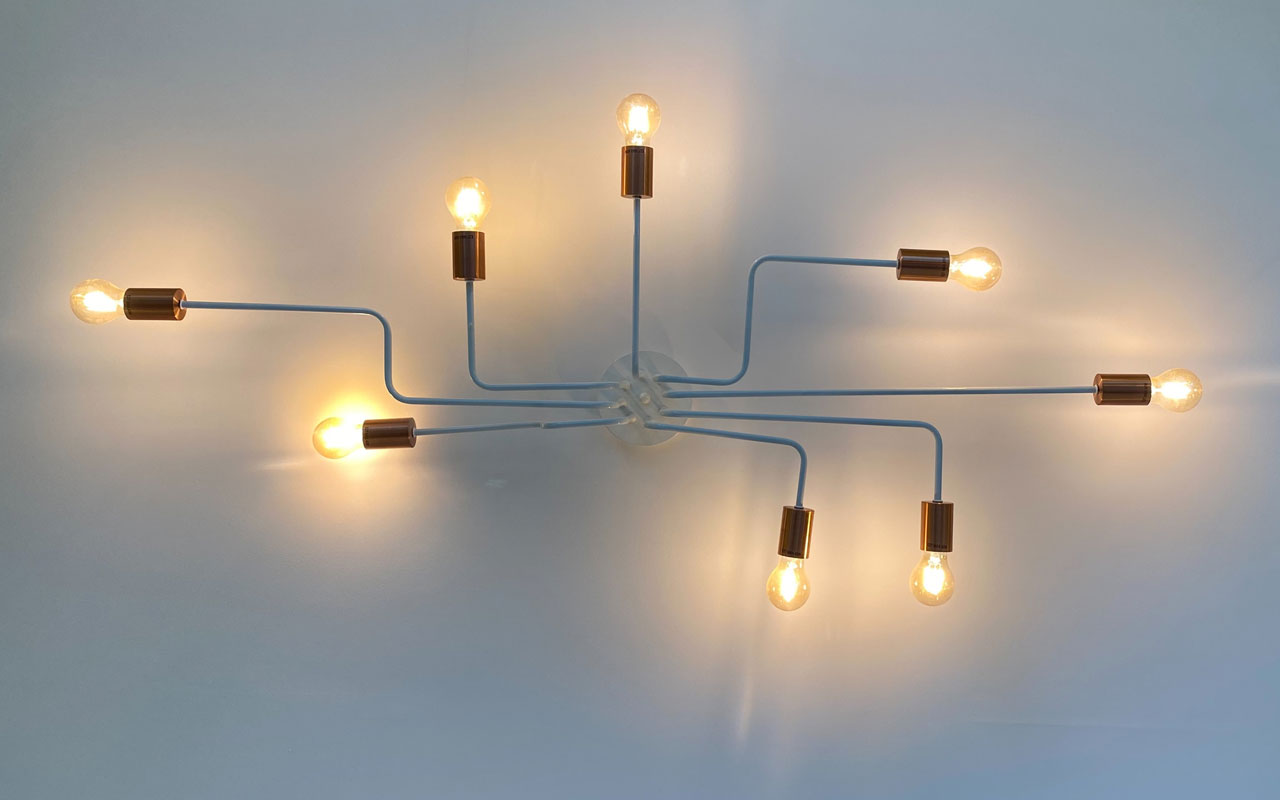 一种思维导图形状的现代灯具，灯光向四面八方延伸。